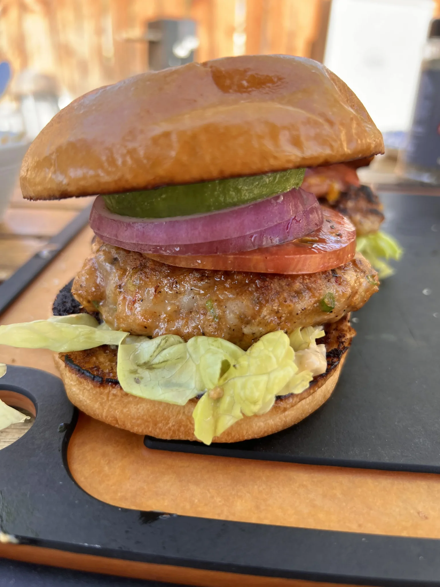 shrimp burger on a cutting board