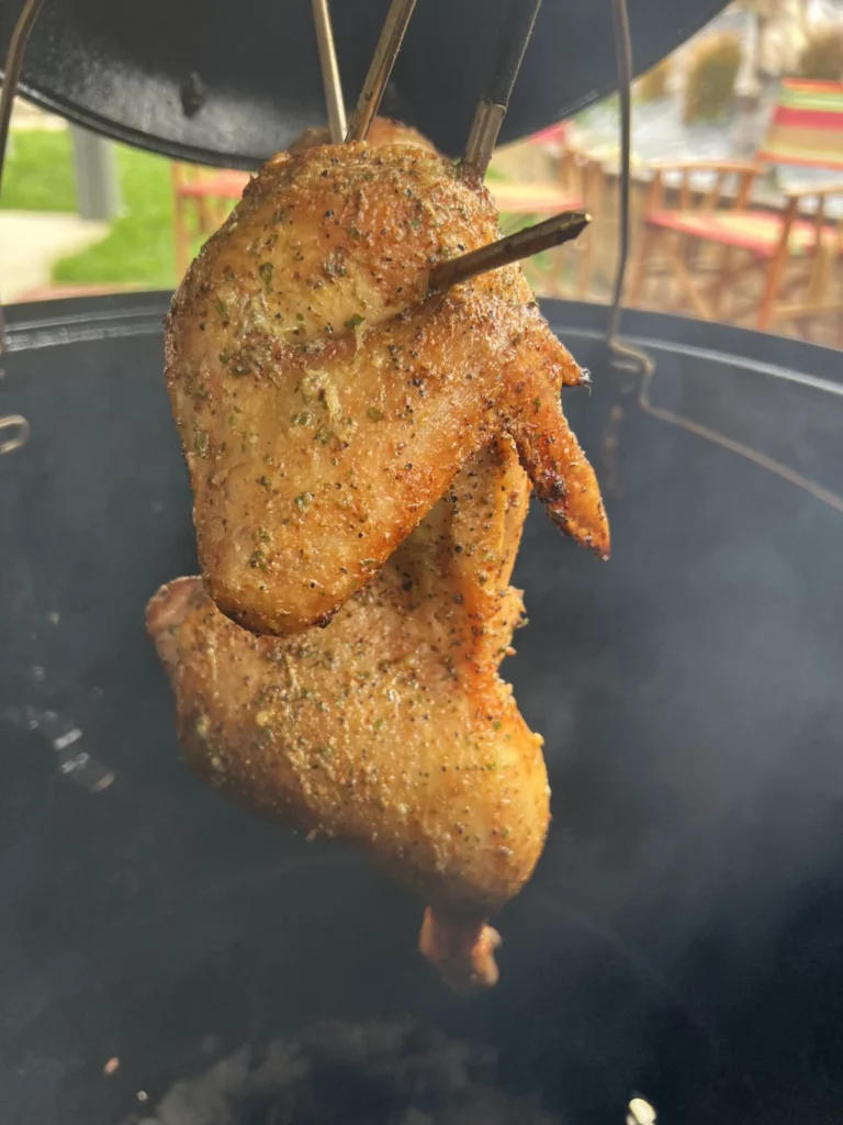 chicken halves in the smoker