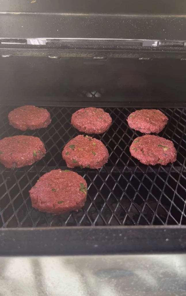 smoking burgers on the grill