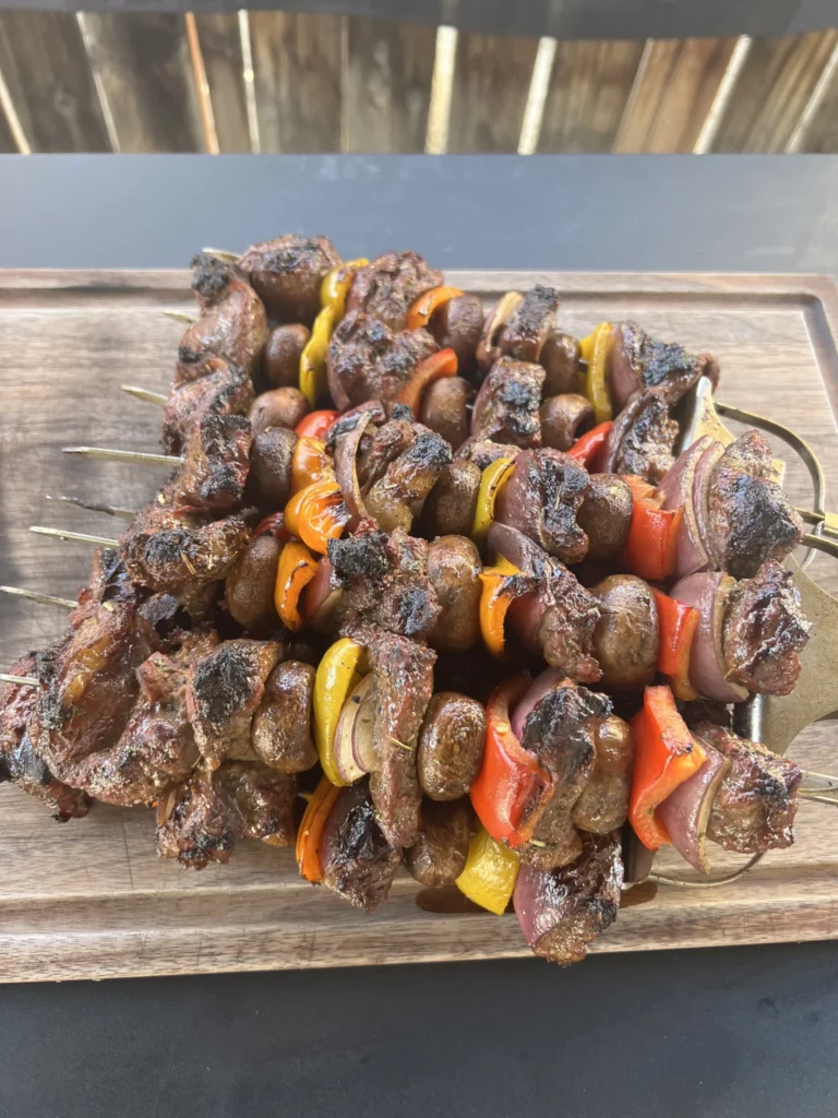 finished kabobs on the cutting board