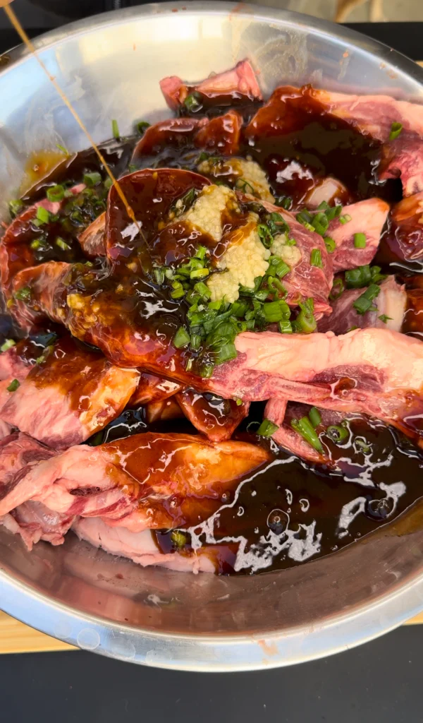 flanken beef in a bowl with the marinade