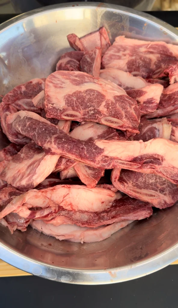 beef ribs in a bowl ready to be cooked