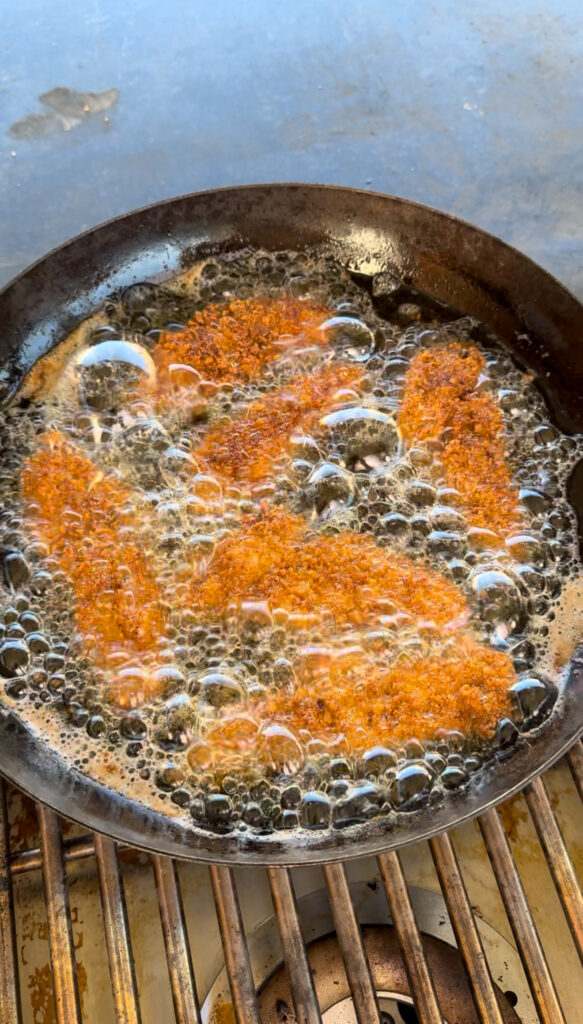 frying chicken in oil