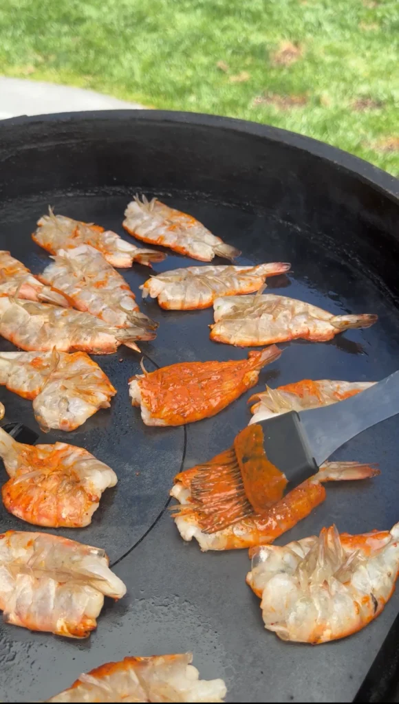 searing the shrimp on a cast iron 