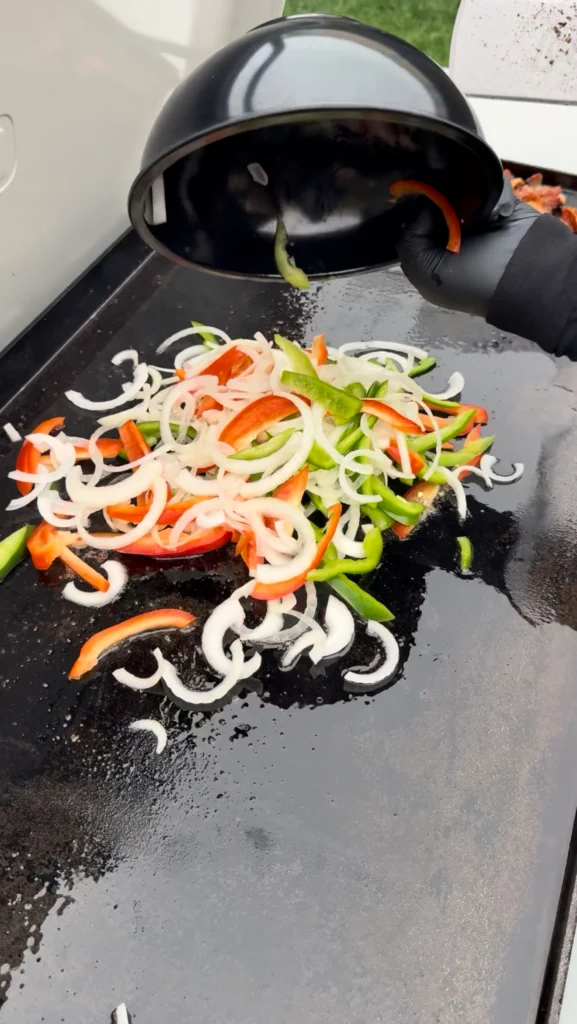 chopped vegetables on the griddle