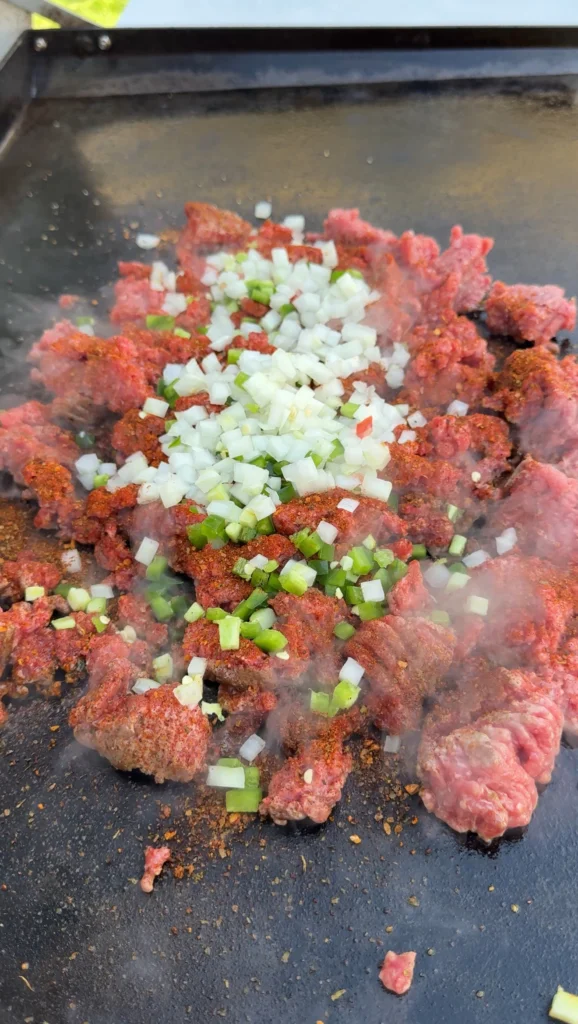 cooking ground beef on the flat top
