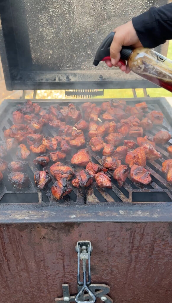 braising pork belly on a grill