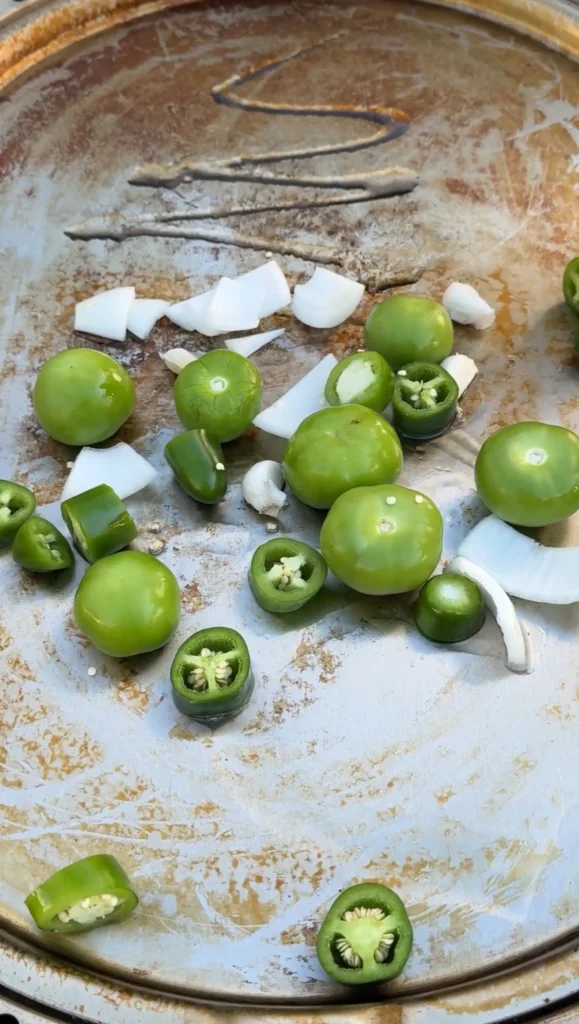 roasting ingredients in a pan for the salsa