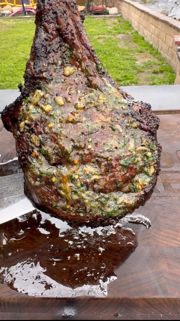 Grilled Tomahawk Steak with Roasted Garlic and Herb Butter