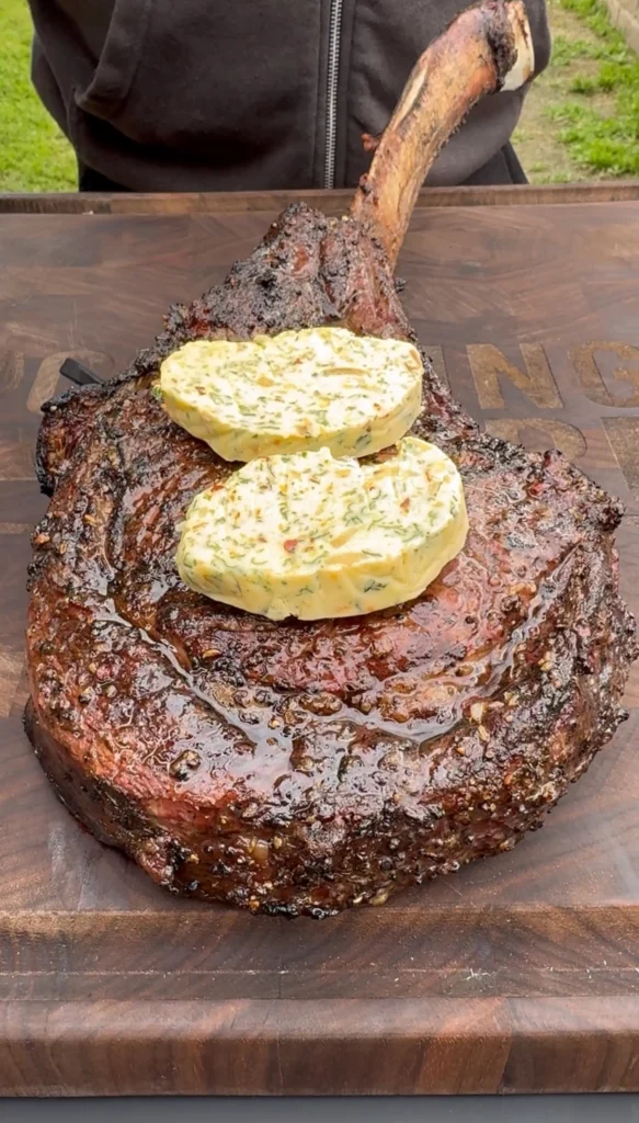 steak with a compound butter on top melting