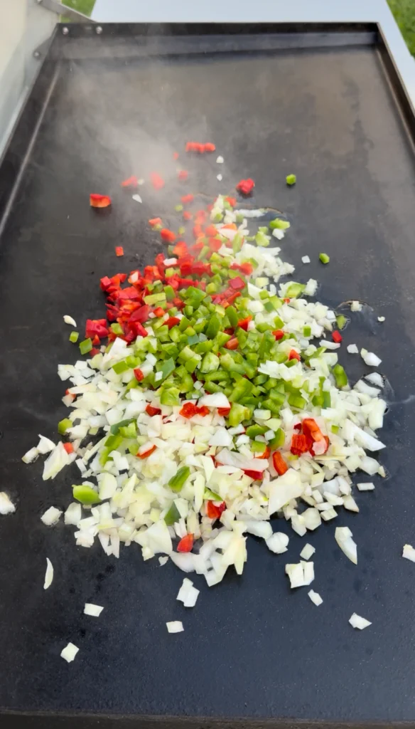cooked vegetables on the griddle