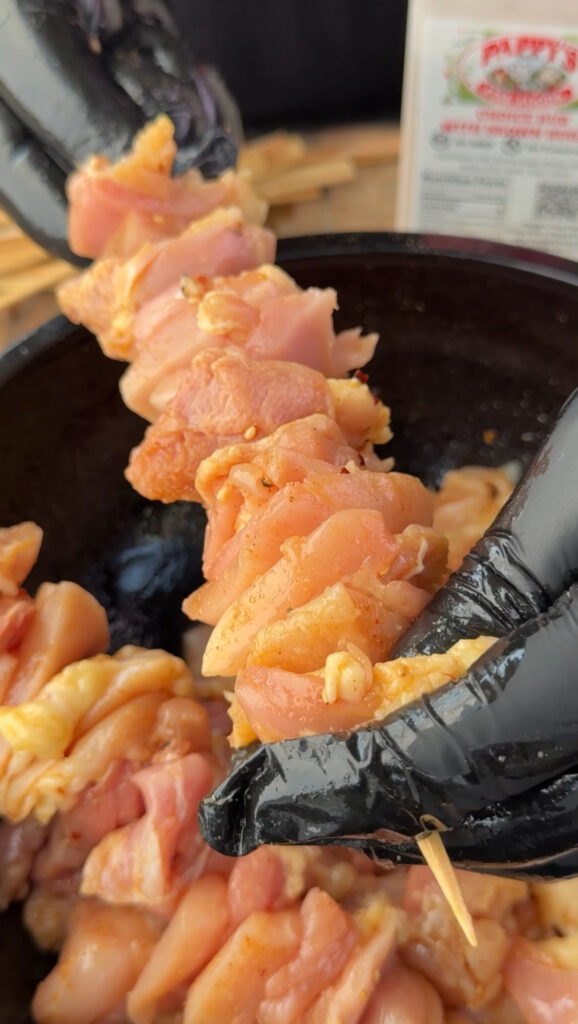 seasoned chicken on skewers