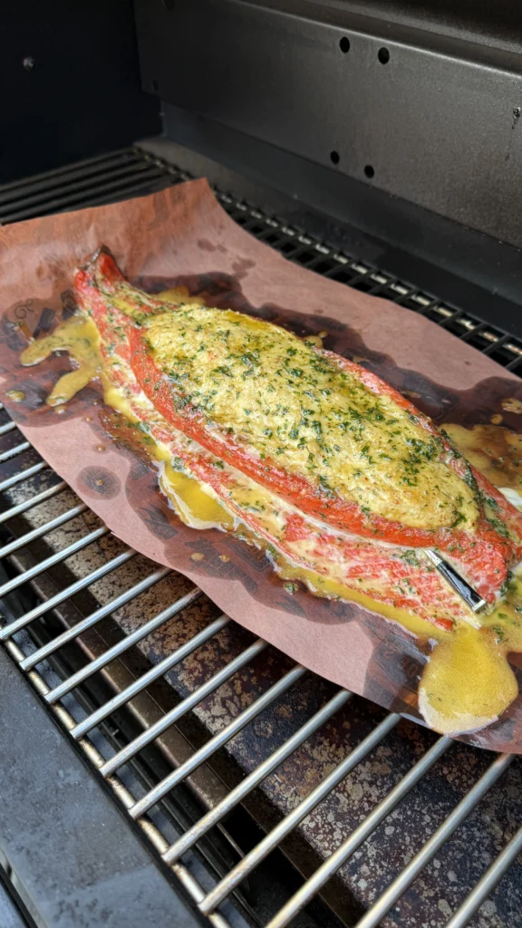 Overhead shot of plated smoked crab stuffed salmon