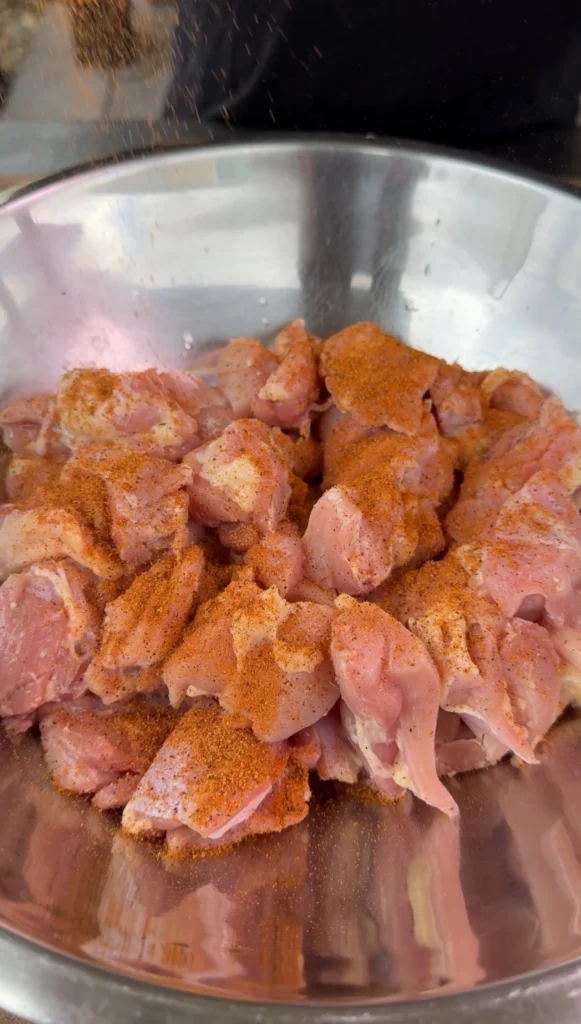 seasoned chicken thighs in a bowl