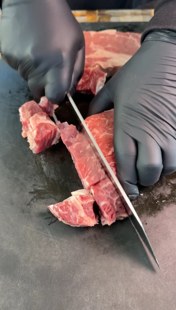 sliced ribeye on a cutting board