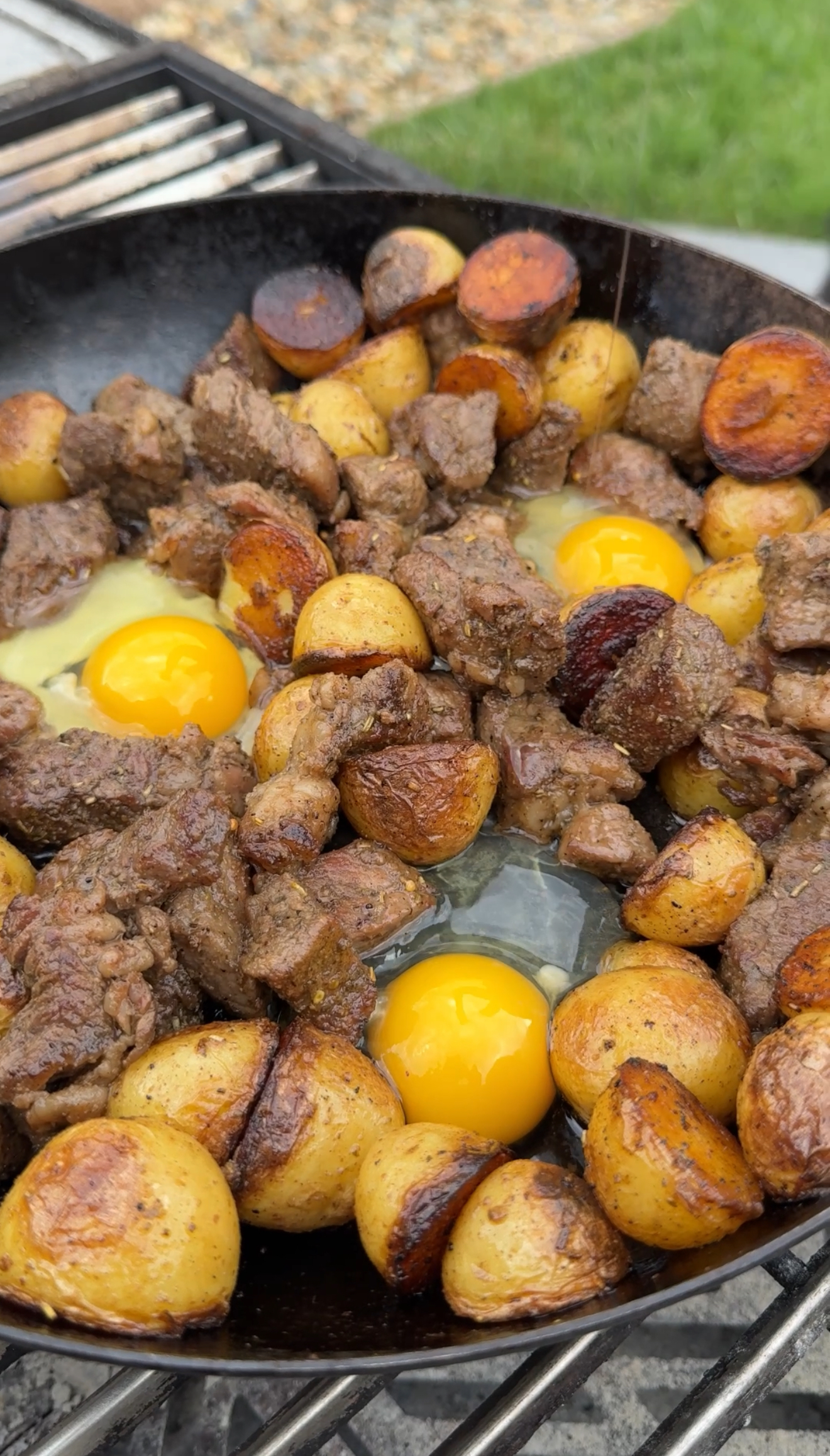 easy cast iron steak and potatoes recipe being cooked