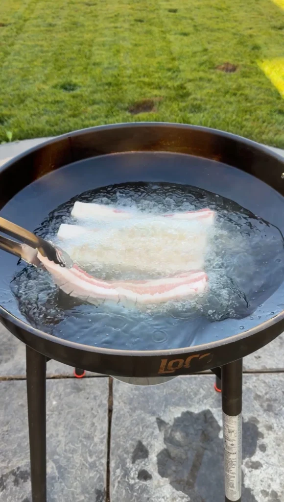 lightly cooked chicharrónes in oil on the loco