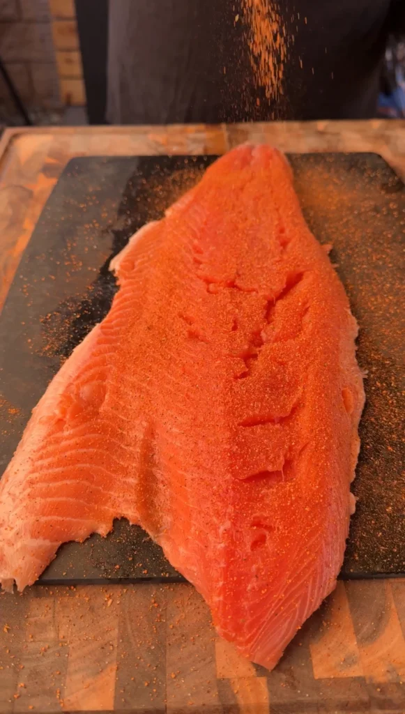 salmon filet on a cutting board