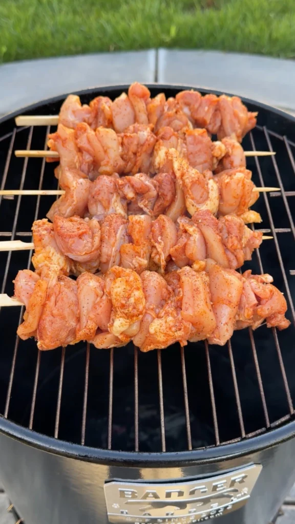 chicken skewers over the smoker