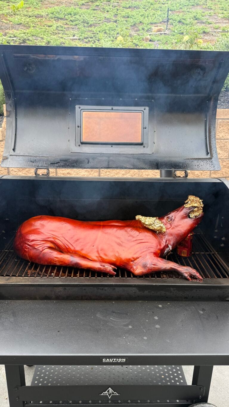 smoking whole pig in a smoker