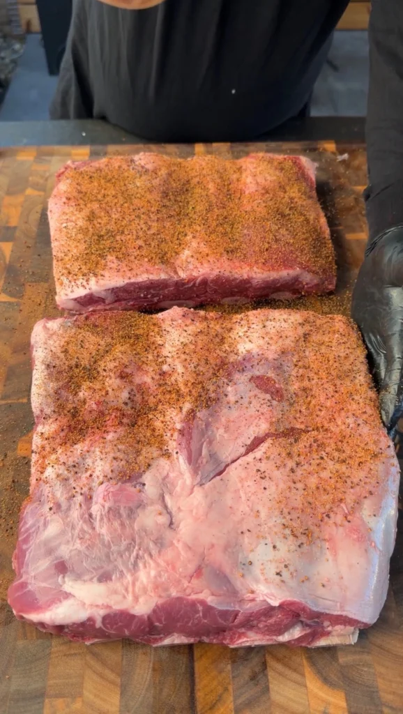 seasoned beef ribs on a cutting board
