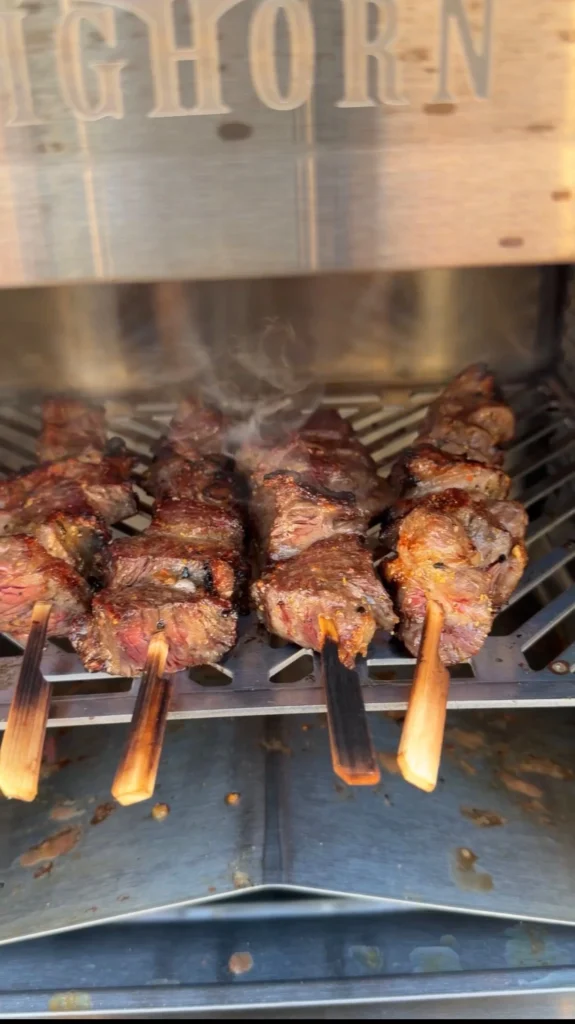 cooking steak bites on an infrared cooker