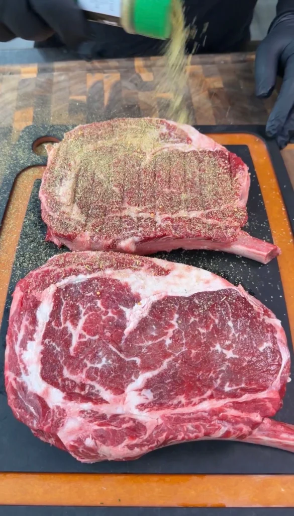 seasoning the cowboy steaks