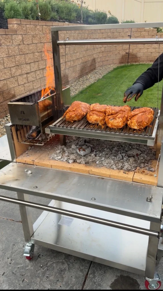 smoking the chickens on an open grill