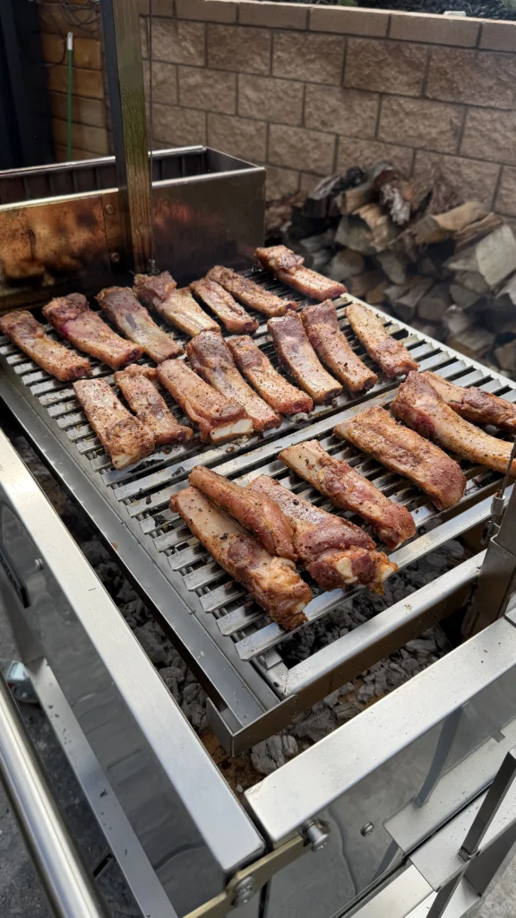 individually cut ribs on the smoker