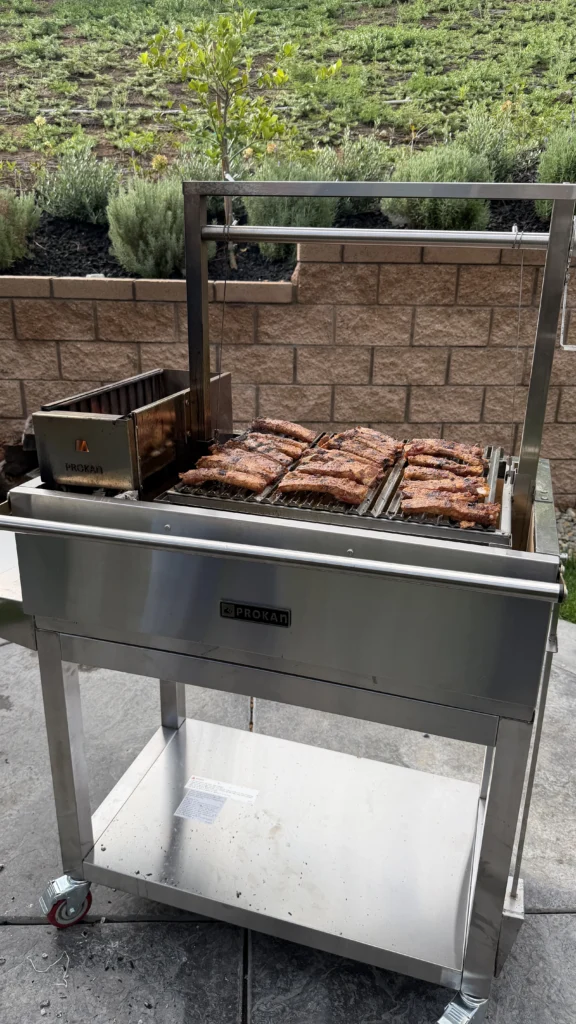 cooking the ribs on the smoker