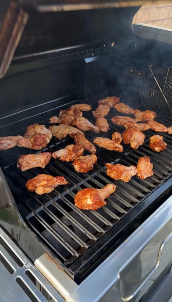 cooking the wings on the smoker
