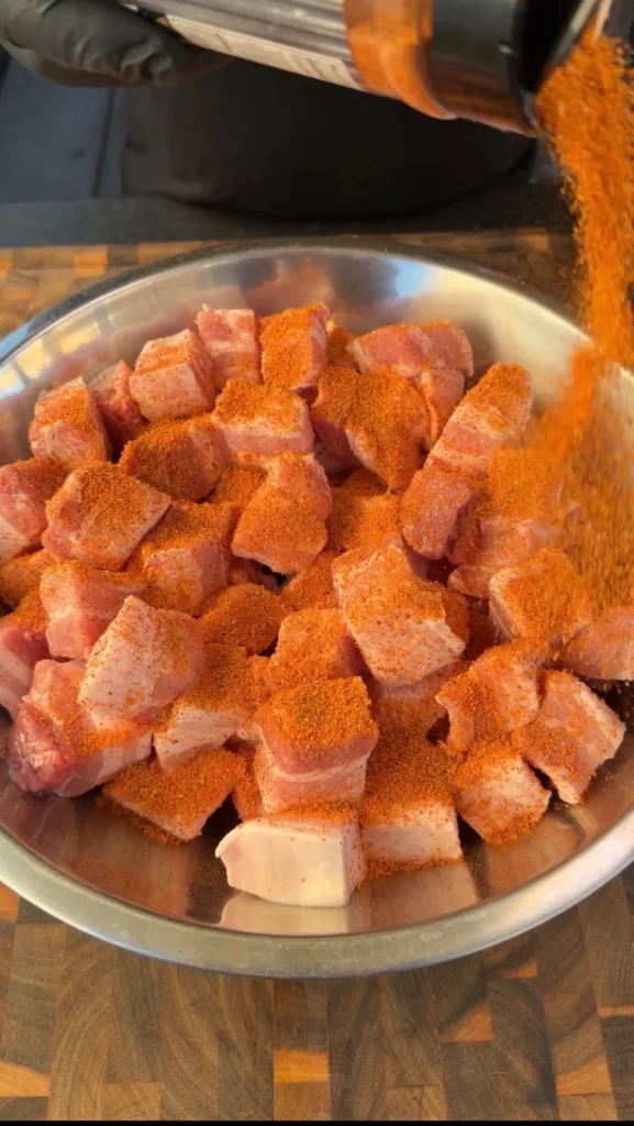 seasoned pork belly in a bowl