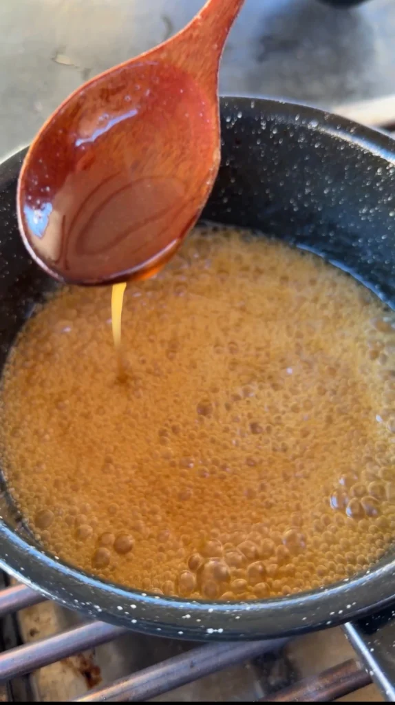 apple cider glaze in a cast iron