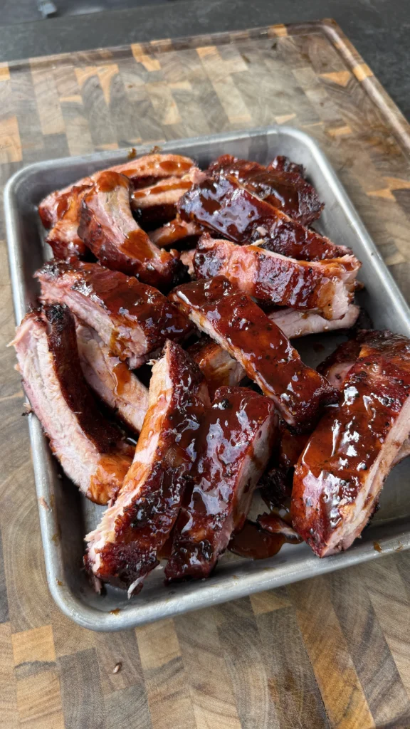 jack and coke ribs in a metal tray
