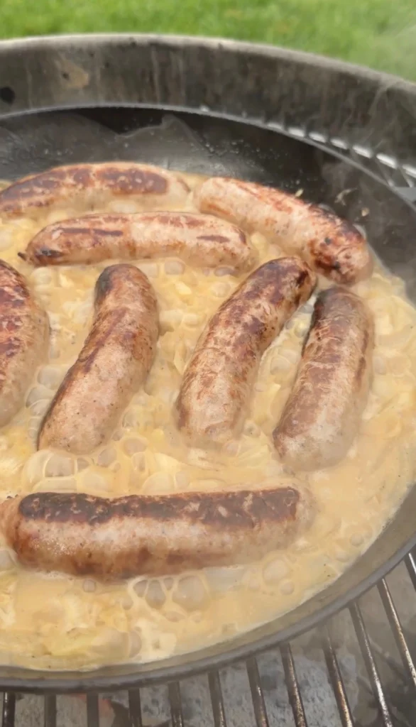 beer in the pan with the brats