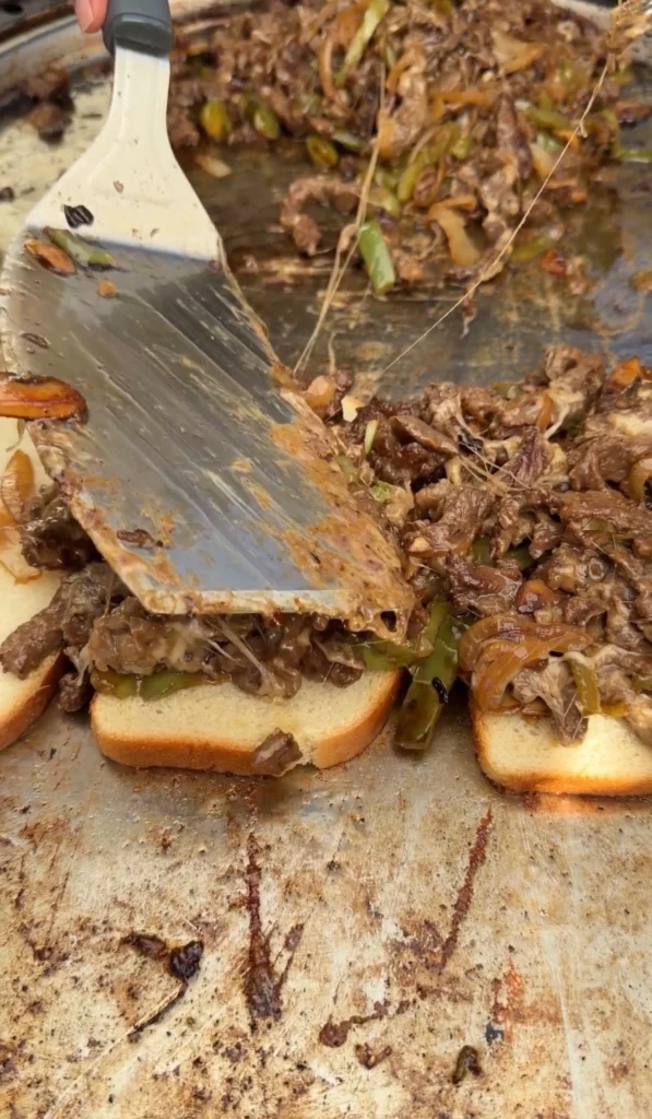 assembled cheesesteak sandwiches