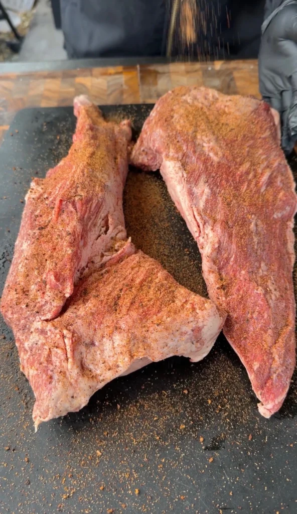 seasoned tri tip on the cutting board