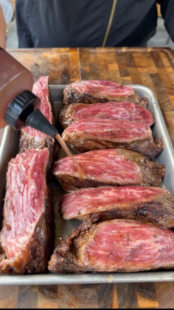 sliced tri tip on the cutting board