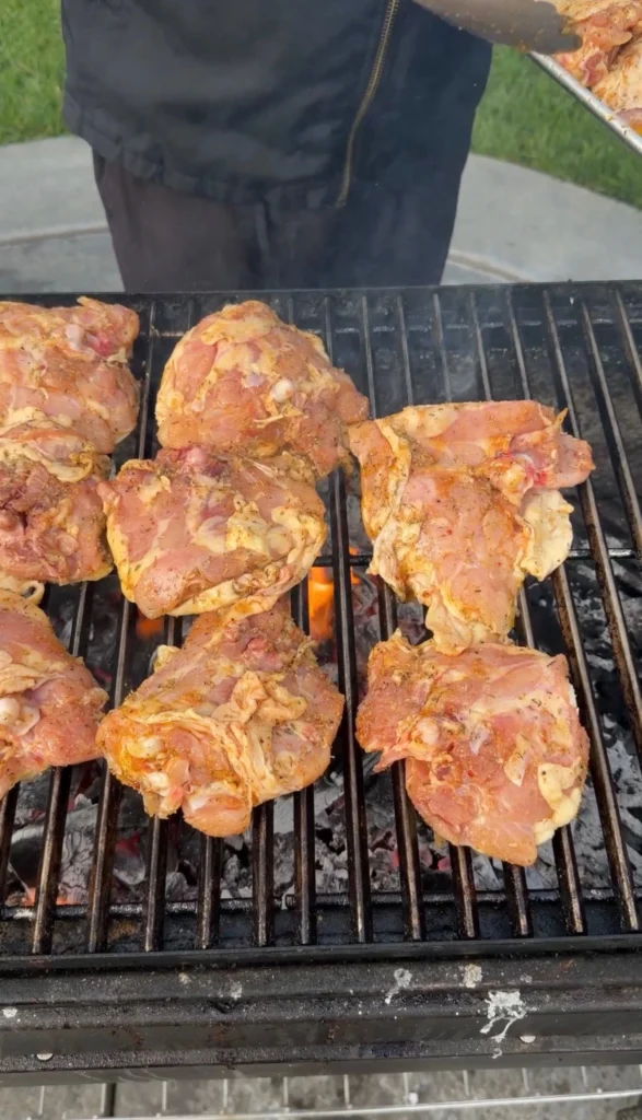 honey garlic chicken thighs on the grill grates