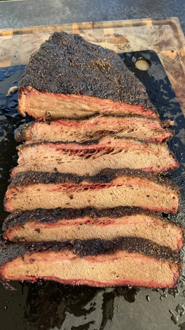 smoked brisket on a cutting board