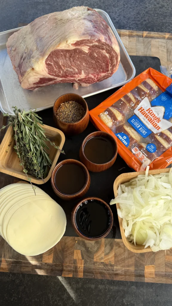prime rib sliders ingredients on a cutting board