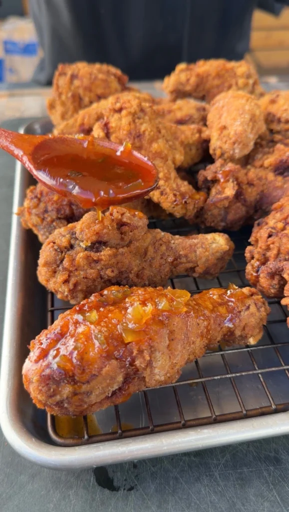 glaze being put on the chicken 