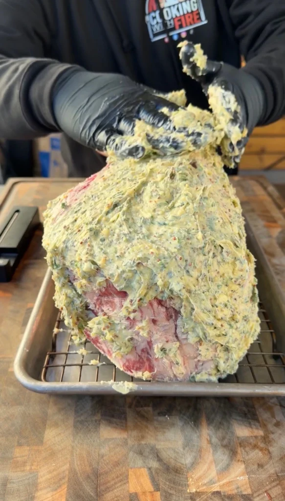 prime rib roast with the garlic butter on it