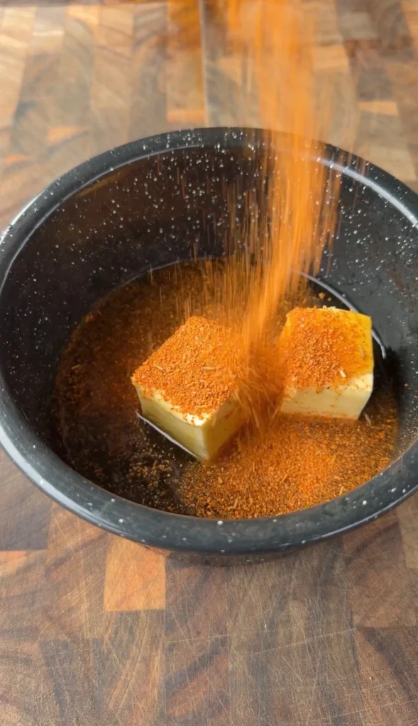 maple bourbon glaze in a black bowl