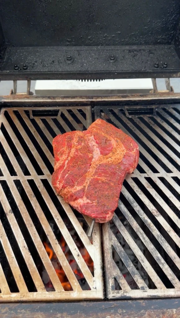 chuck roast on the smoker for pulled beef sandwiches