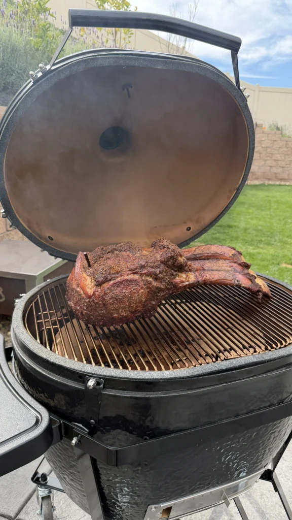 tomahawk steak roast on a smoker