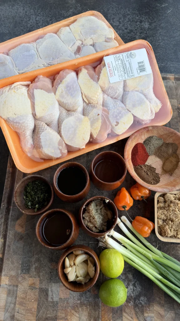 jerk chicken ingredients on a cutting board