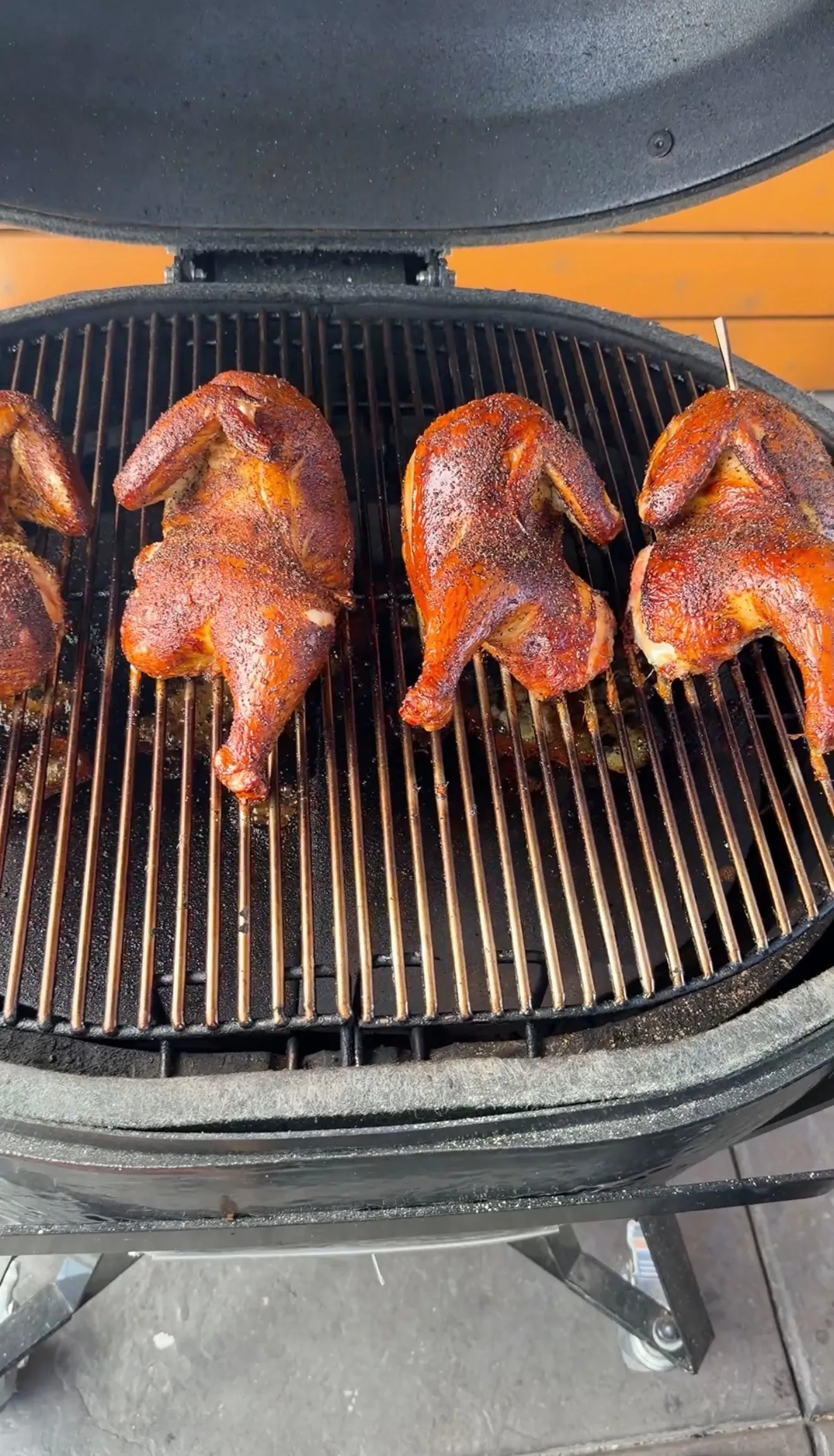 Applewood smoked half chickens on grill