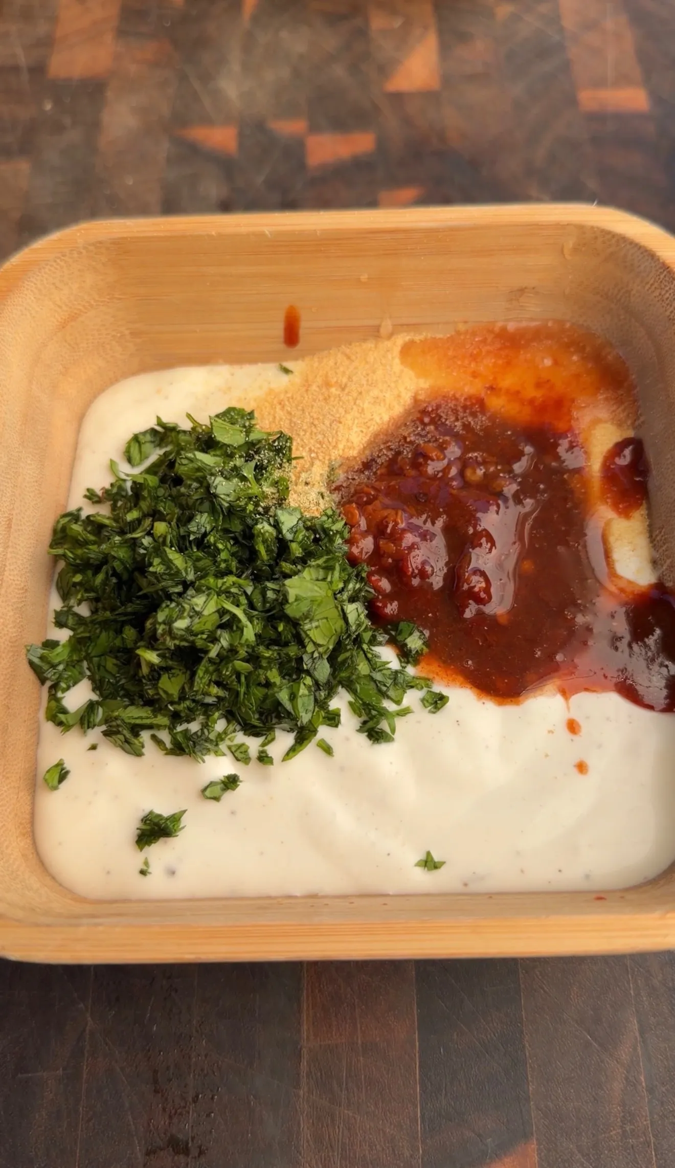 Chipotle ranch dip ingredients in mixing bowl
