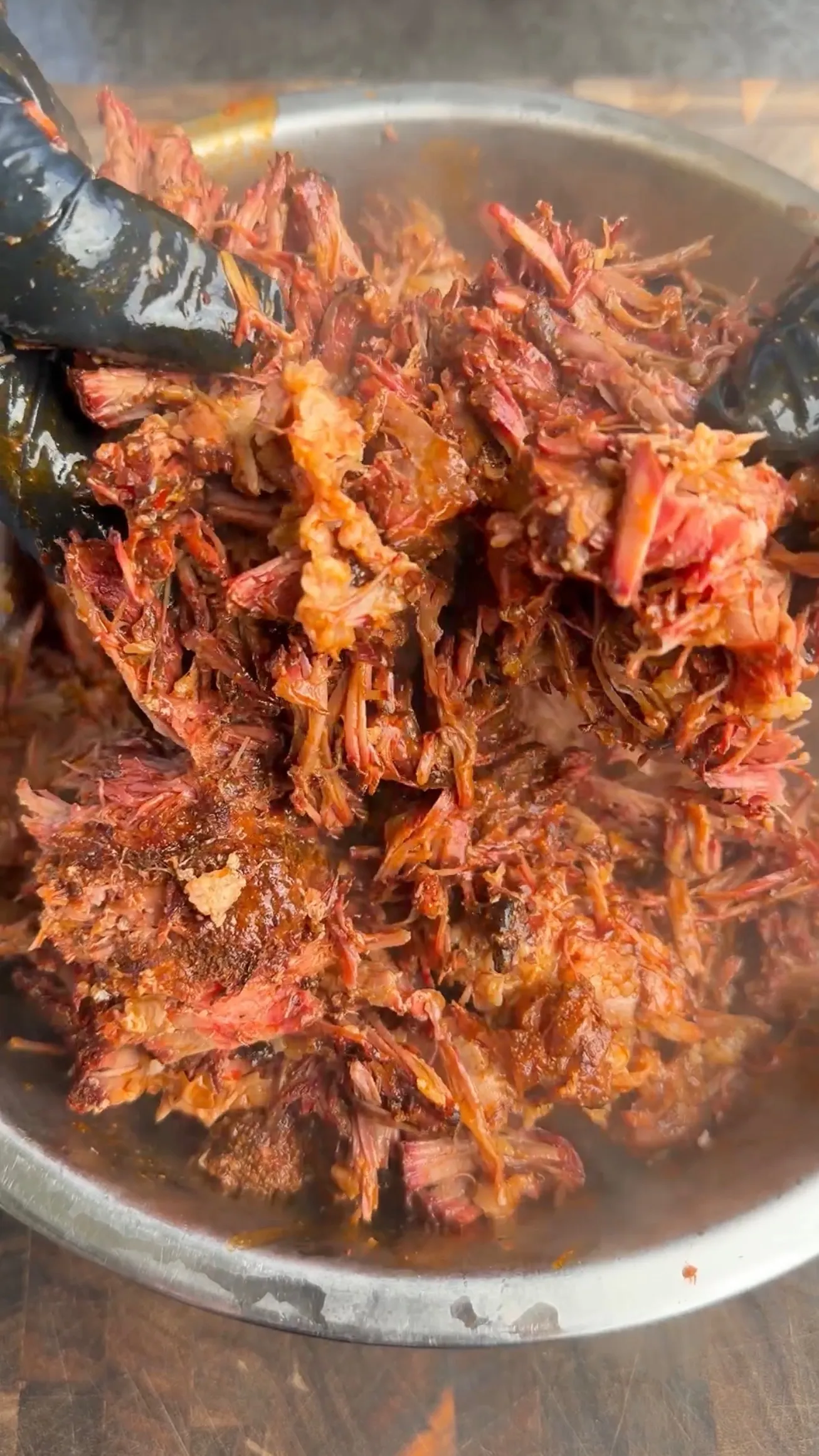 Shredded birria beef in consommé pot